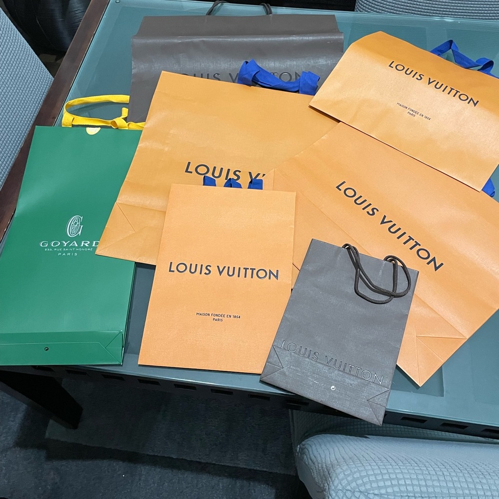 Bundle of Louis Vuitton Shopping bags and One Goyard Shopping bag